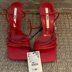 Brand new never worn with tags red Strappy heels.